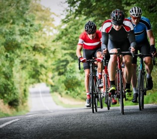 group of cyclists on a road