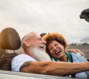 Happy senior couple - find convertible cars for sale